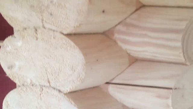 Шлифовка сруба из оцилиндрованного бревна