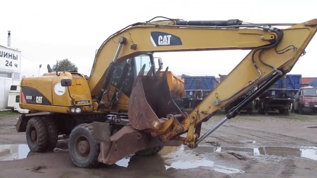 CAT M315 колесный экскаватор