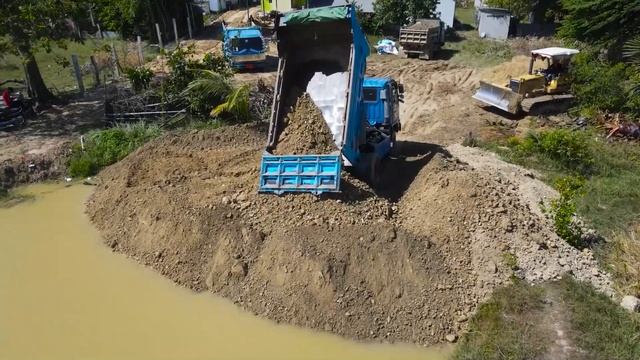 Строительство, новый объект , засыпка пруда