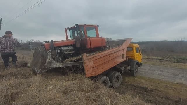 Трактор ДТ-75 с дизелем ЯМЗ-236, заезд на КамАЗ