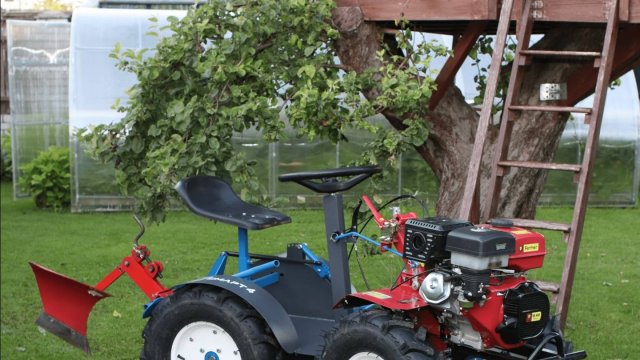 Полноприводный адаптер  4х4 + Asilak SL -186L. Колеса 7х12 универсальные. 
Сайт:https://mikrotrak.ru