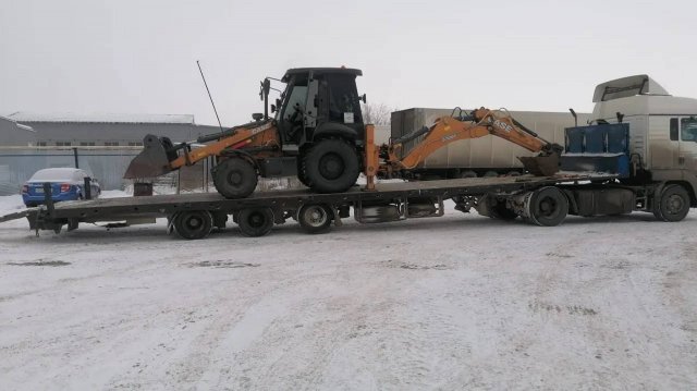ПЕРЕВОЗКА ЭКСКАВАТОРА ПОГРУЗЧИКА НИЗКОРАМНЫМ ПОЛУПРИЦЕПОМ/ТРАКТОР ЗАЕЗЖАЕТ НА #ТРАЛ/ #ГРУЗОПЕРЕВОЗА