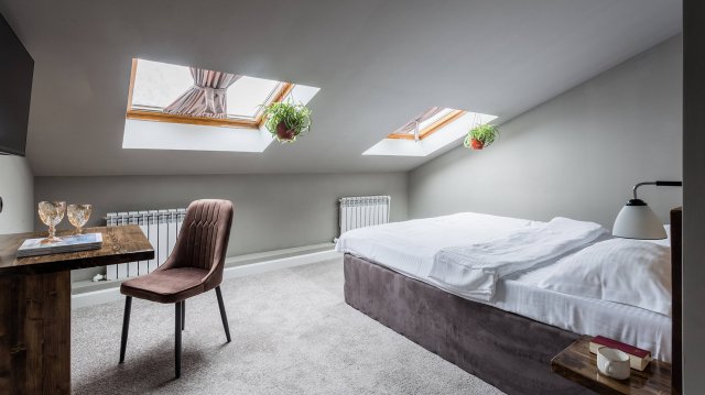 Номер стандарт на мансарде в отеле Тихонов