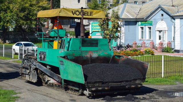 Старый немецкий асфальтоукладчик Vögele Super 1800-3/Der alte deutsche Fertiger Vögele Super 1800-3