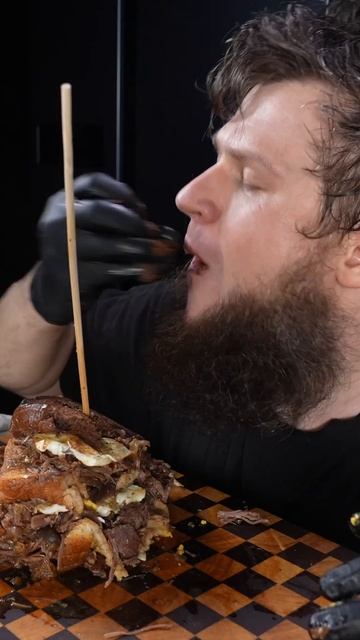 TOWER BEEF SANDWICH EATING