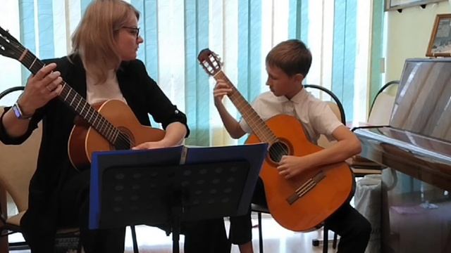 Коломина С.В. Развитие образного мышления учащихся младших классов. (Народные инструменты. Гитара)