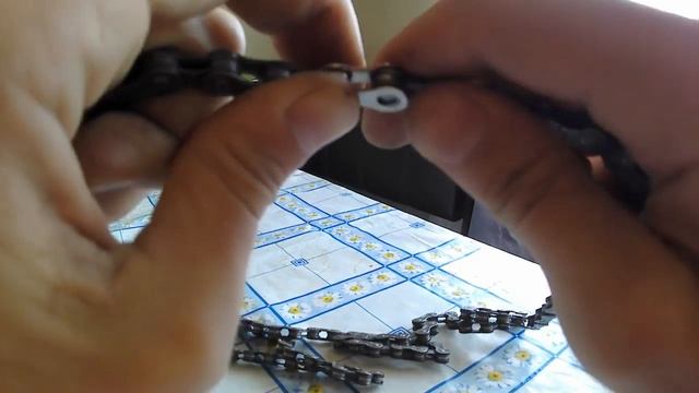 Как одеть замок на цепь?Как снять?Без инструмента