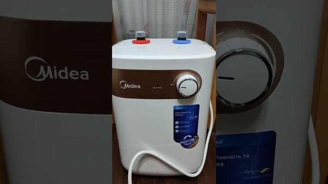 Полезная техника для дома."Електрический водонагреватель Midea".