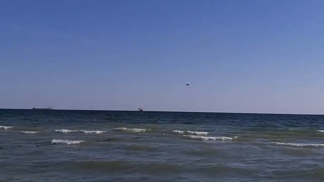 Полет на дельтаплане над морем