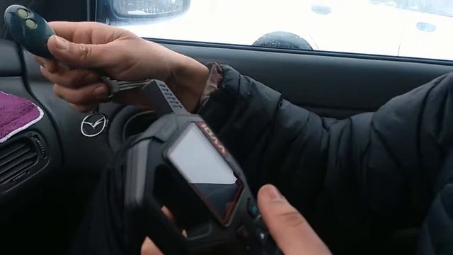 Замена брелка сигнализации на выкидной ключ с управлением открытия дверей авто.