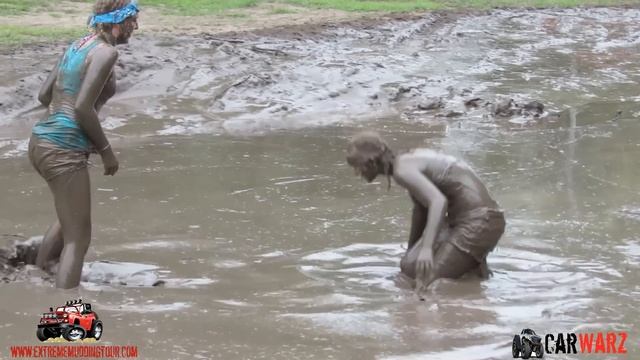 LOTS OF GIRLS AND LOTS OF MUD WRESTLING AT MUD BOGS IN MICHIGAN