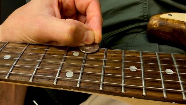 Как настроить высоту струн на электрогитаре