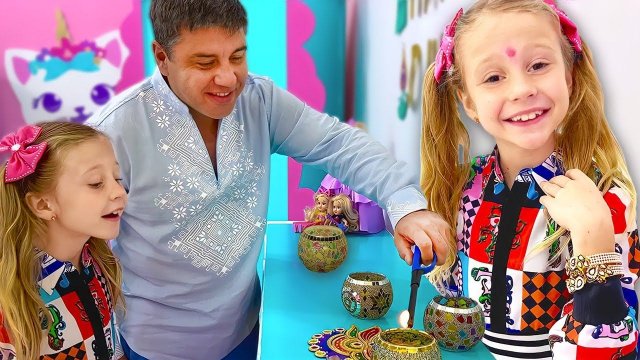 Настя и папа празднуют Дивали