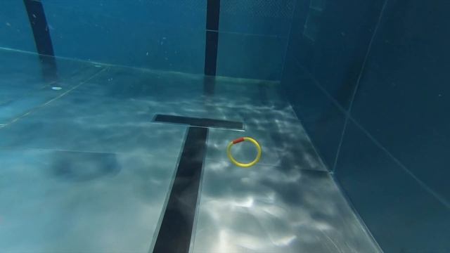 Carla Underwater Swimming alone in the pool.