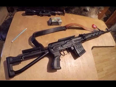 Краткий обзор карабина Тигр-02 . Короткий ствол, длинный пламегаситель и складывающийся приклад.