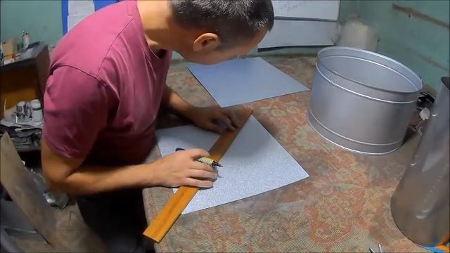 Большой искрогаситель на трубу из чёрной стали.