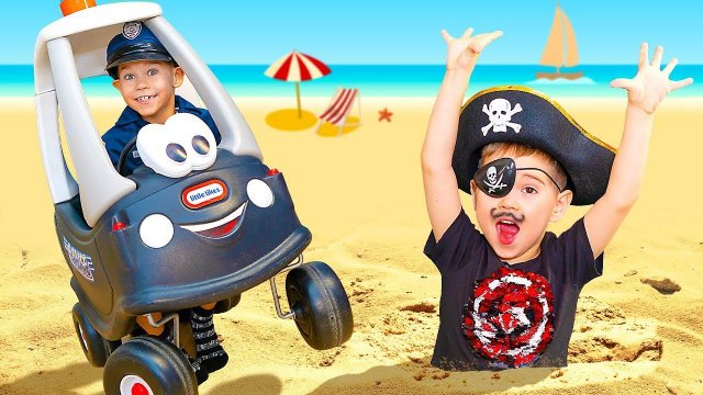Toy car help to pull Pirate out of the sand on the sea 0+