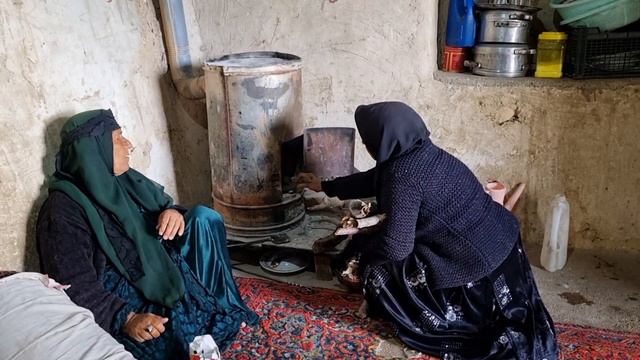 Working to earn money by a nomadic woman and her child