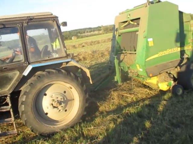 Пресс подборщик Джон Дир-582 на сенокосе 2020.