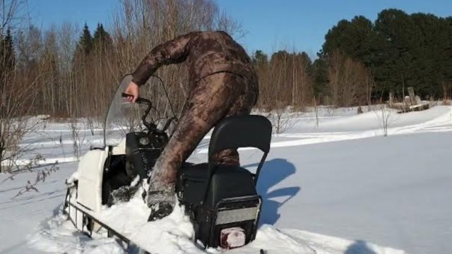 Буран и тайга и мотобуксировщик по пухляку.